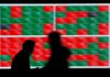 Asia shares dip on hawkish Fed remarks; commods rise on China reopening
