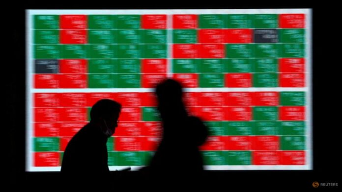 Asia shares dip on hawkish Fed remarks; commods rise on China reopening