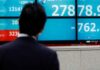 Asian stocks edge up before US jobs data, defying Wall Street selloff