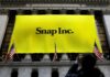 Snap swings to quarterly net loss, expects lower rev in Q1