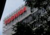 Toshiba Q3 operating profit slumps, cuts full-year estimate