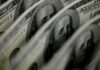 Dollar’s crown to slip as peers catch up in rates race: Reuters poll
