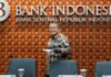 Indonesia central bank keeps rates unchanged, sees inflation back on track sooner