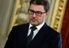Italy economy minister cautious over trade ties with China