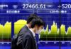 Stocks waver, dollar softens as investors weigh earnings, data