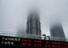 Asian stocks sink on debt ceiling jitters