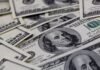Dollar calm as debt ceiling talks to resume