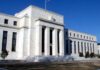 Big central banks hike again with end in sight