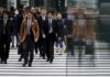 Japan says sees pick up in business sentiment for the first time in 7 months