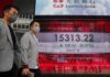 Asia stocks edge higher as China acts on housing, yuan weakness