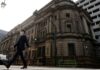 BOJ may hold off on ending negative rates until April – ex-board member