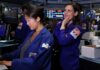 Stocks slide, US yields rise after hawkish Fed stance