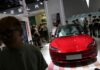 Tesla’s deliveries expected to fall on plant shutdowns, soft demand