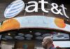 AT&T’s equipment writedown hurts annual profit view, shares slip