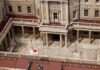 BOJ keeps ultra-loose policy intact, cuts inflation forecast