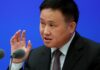 China to cut amount banks hold in reserve to boost lending