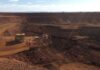 Fortescue works to clear iron ore held in China as quarterly shipments rise