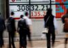Japan leads Asia stocks higher, central banks loom