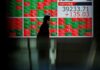 Analysis: Soaring Japanese equities offer investors cozy distance from troubled China