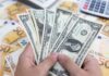 Dollar scales fresh peaks as Fed cut bets recede