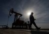 Oil prices near flat as demand worries offset Middle East risk
