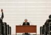 BOJ will eventually scale back bond buying, says gov Ueda