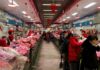 China’s consumer prices swing up on seasonal Chinese New Year gains