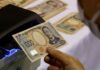 Japan repeats verbal warning against yen bears, BOJ keeps dovish tone