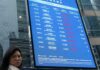 Tech pulls down Asia stocks, dollar gains on inflation data