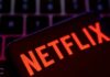 Netflix slips after stopping subscriber tally report, downbeat Q2 revenue forecast