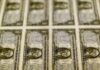 Dollar consolidates as Fed urges patience; markets await meeting minutes