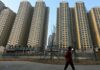 Shanghai lifts home-buying curbs to boost property sector