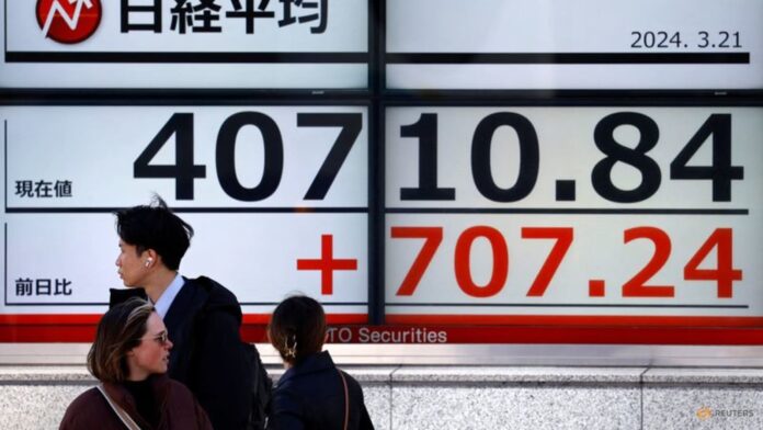 Asia shares set for weekly gain on rate-cut rally