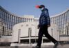 Chinese money flows into bonds even as central bank warns of risks