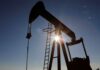 Oil prices slide on fears of slow US demand after surprise inventory build