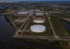 Oil prices slip despite OPEC+ production cut extension