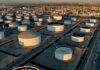 Oil up on firming demand, Mideast tensions underpin risk premium
