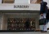 Burberry replaces chief executive and warns on profits