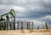 Crude turns negative as hurricane fears fade