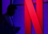 Netflix beats subscriber targets but cautions on next quarter