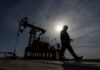 Oil prices inch up on large US crude stock draw