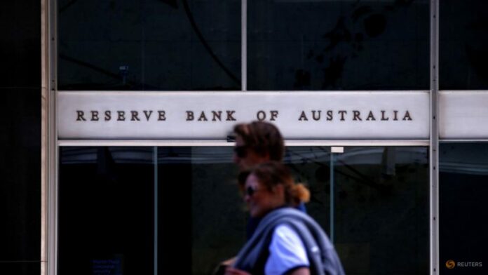 Australia central bank holds interest rates at 4