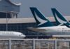 Cathay Pacific says profit drops 15% on lower fares, declares dividend