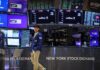 World shares extend gains, dollar undermined by dovish Fed bets
