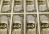 Dollar eases after hitting highest in two weeks, US job data looms