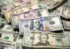 Dollar gains as Powell pushes back on jumbo rate-cut bets