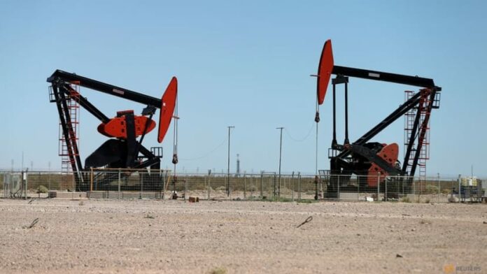 Oil slips on higher US crude stocks; market watches Middle East