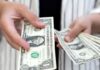 Dollar pulls back from six-month peak after US inflation data