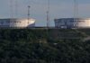Oil falls more than $2 a barrel on possible Middle East peace deal