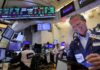 Stocks hit record for second day, yields steady after Fed cut